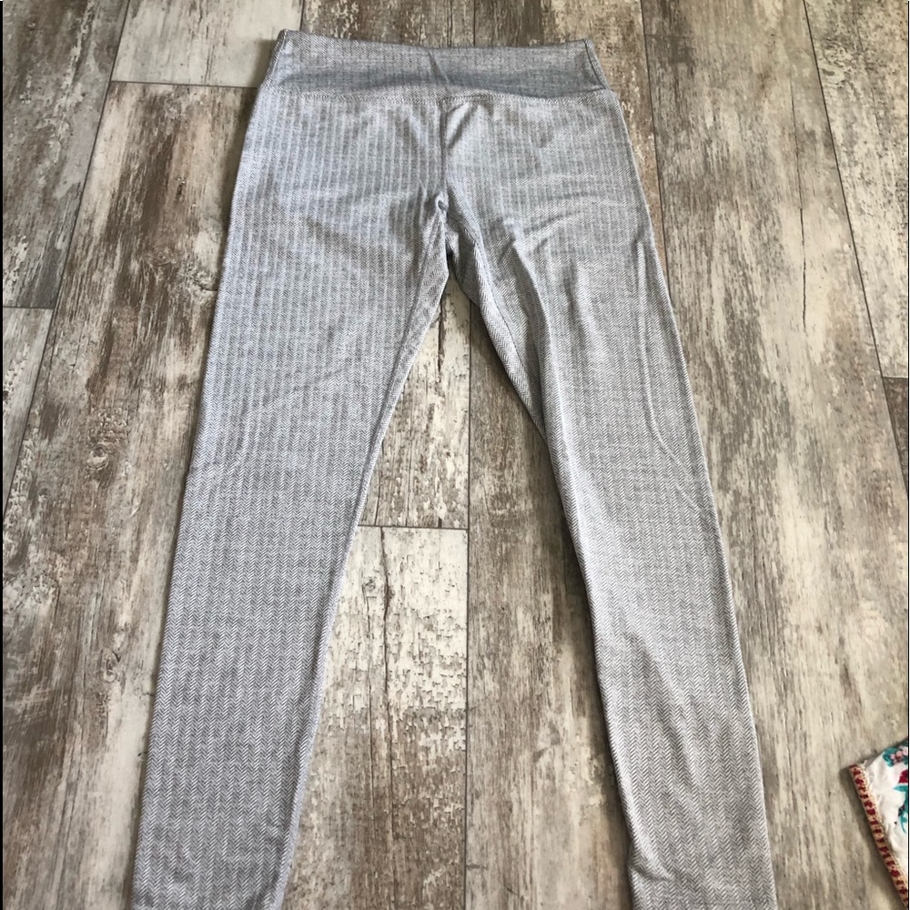 gray and white stripped leggings